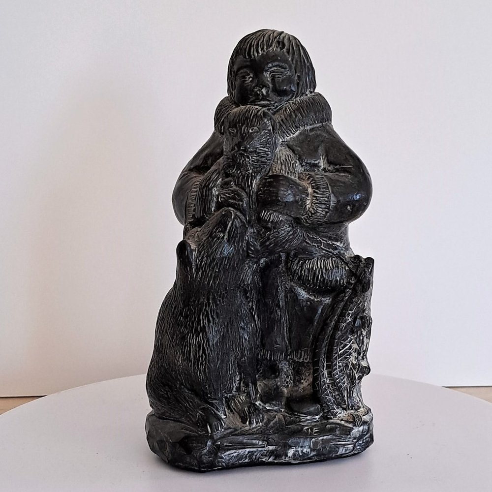 A WOLF original Eskimo sculpture.